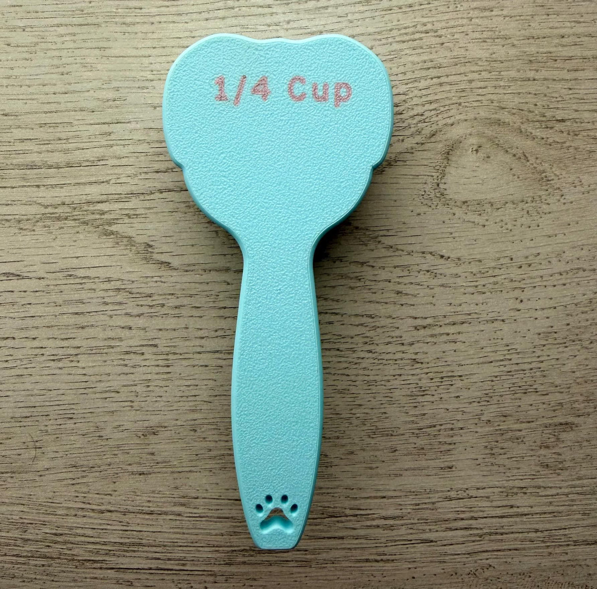 3D printed dog food scoop with a custom pet name, in a two-color finish