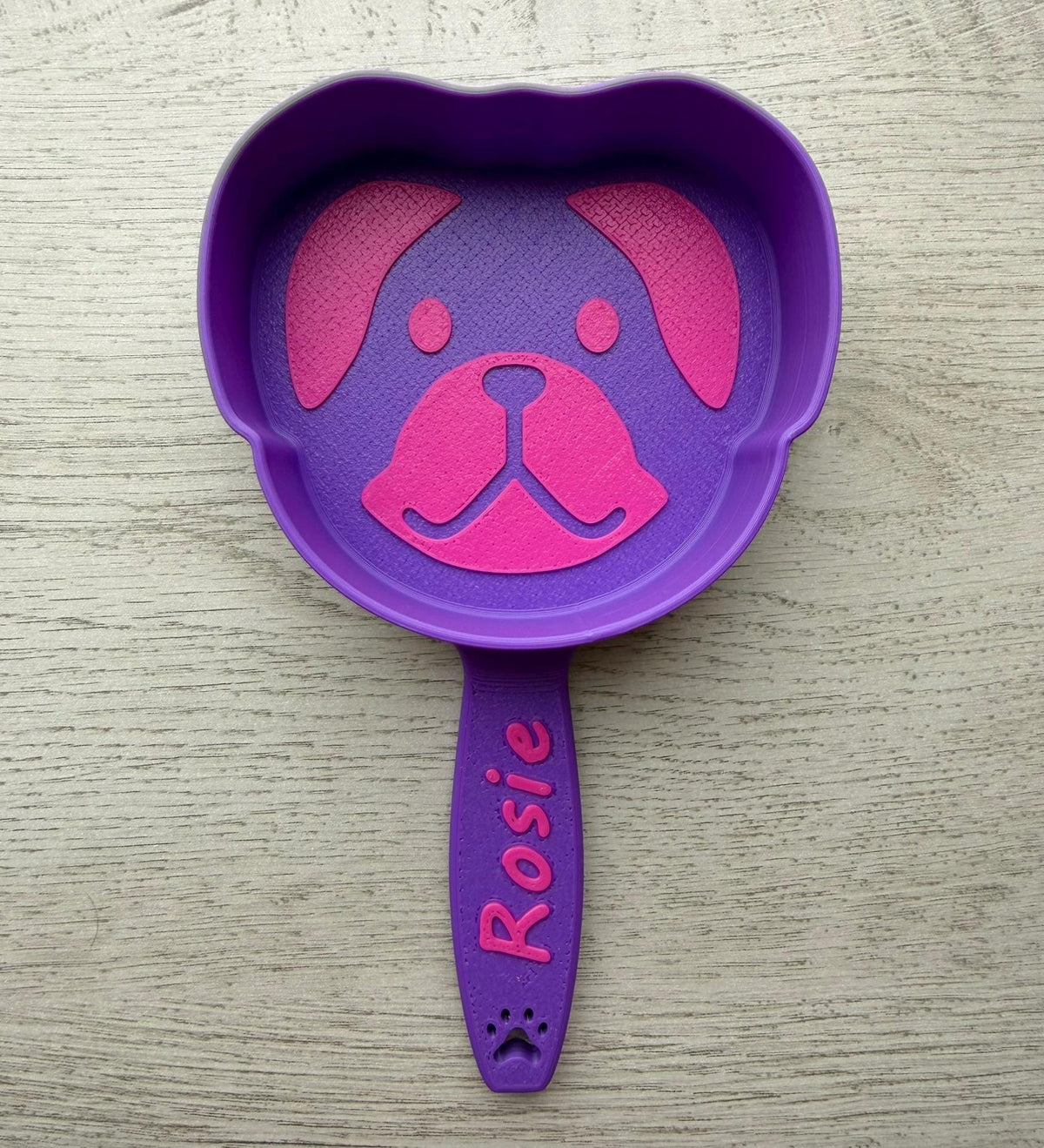 3D printed dog food scoop with a custom pet name, in a two-color finish