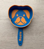 3D printed dog food scoop with a custom pet name, in a two-color finish