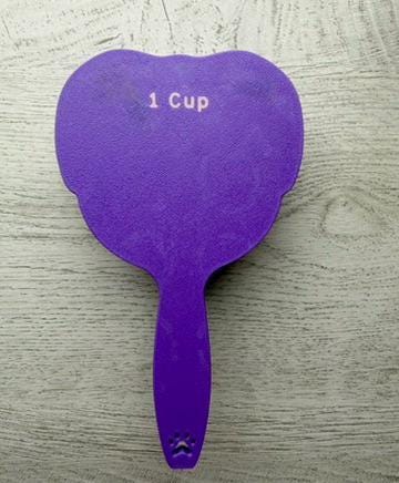 3D printed dog food scoop with a custom pet name, in a two-color finish