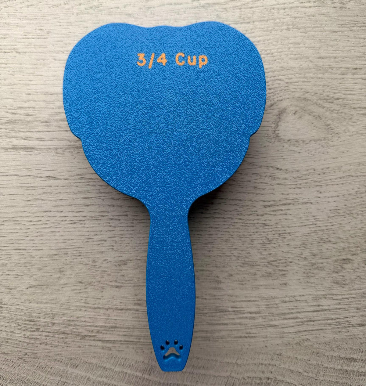 3D printed dog food scoop with a custom pet name, in a two-color finish