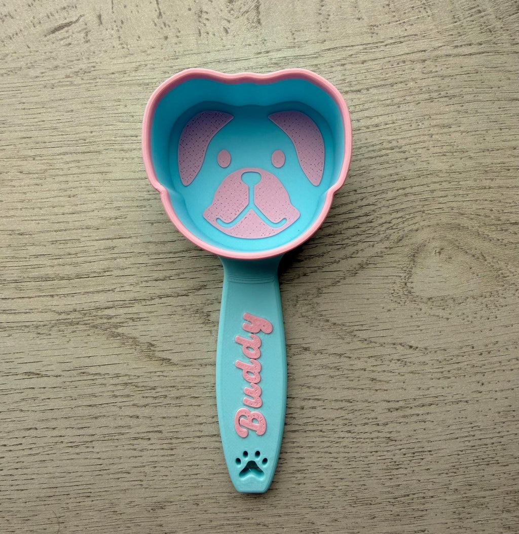3D printed dog food scoop with a custom pet name, in a two-color finish