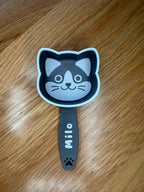 3D printed cat food scoop with a custom pet name