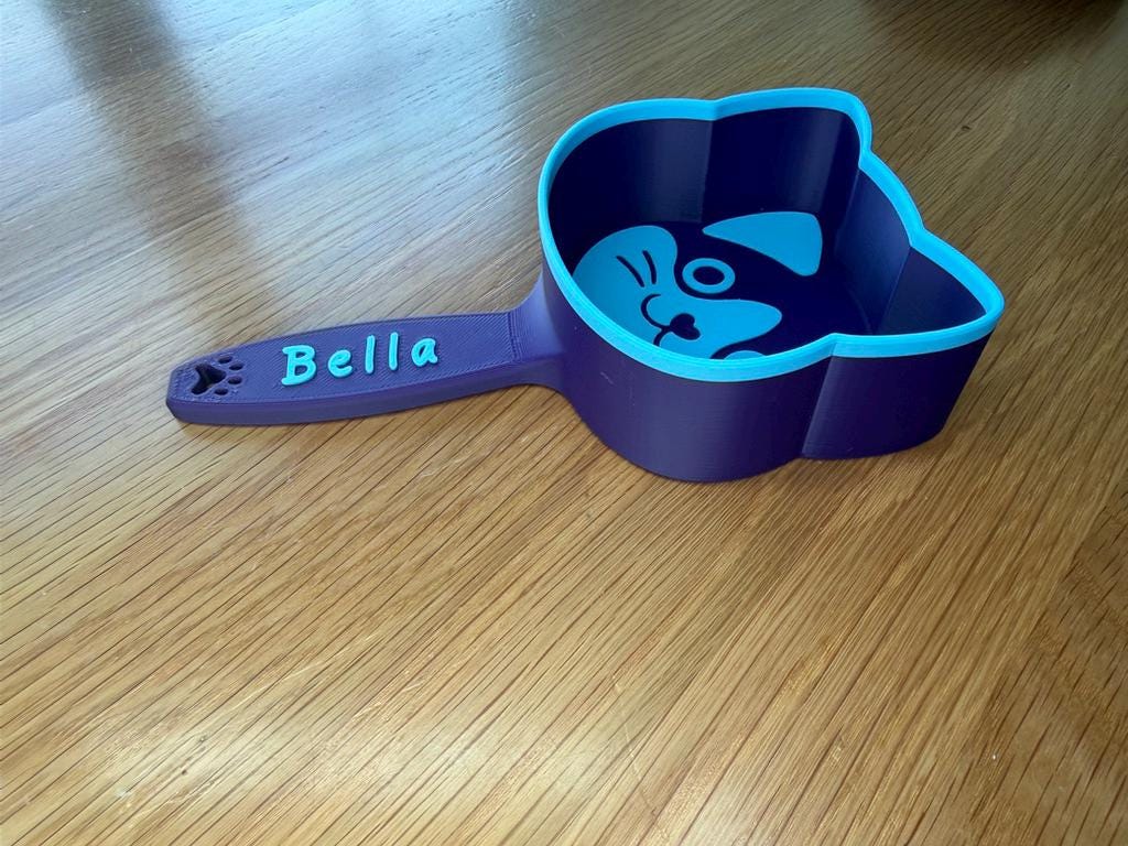 3D printed cat food scoop with a custom pet name