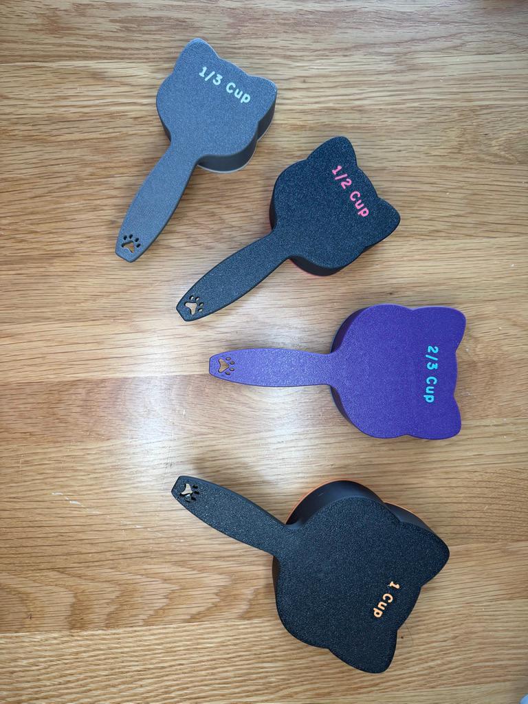 3D printed cat food scoop with a custom pet name