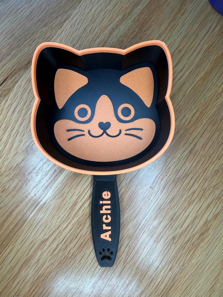 3D printed cat food scoop with a custom pet name