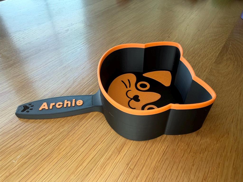 3D printed cat food scoop with a custom pet name
