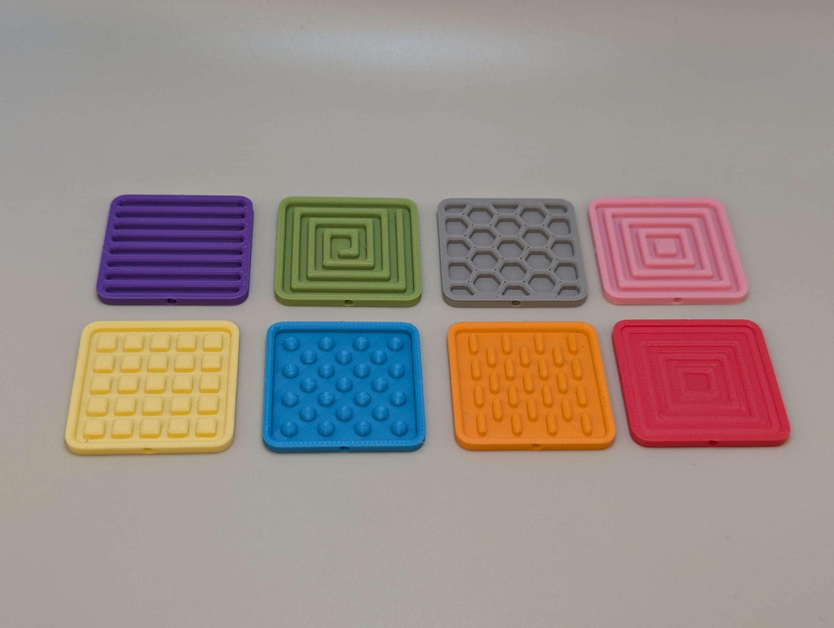 Magnetic fidget slider shown open, with the sliding magnetic core visible