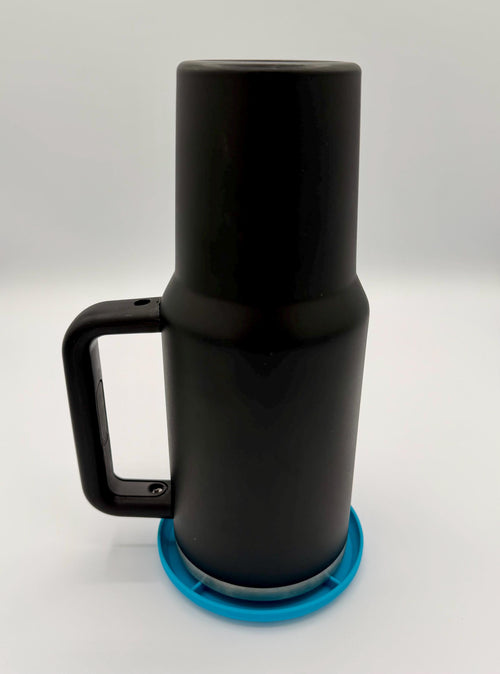 Tumbler drying stands in four colors, showing the drainage channels