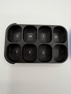 3D printed pill box with a custom name, in a two-color finish